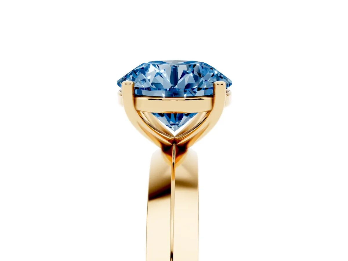Fancy Blue Round Cut Cut Solitaire Engagement Ring with Flat Band and Four-Prong Setting Yellow gold