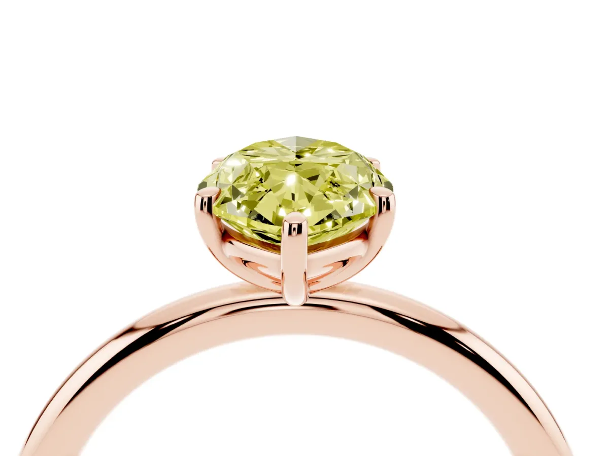 Fancy Yellow Oval Cut Solitaire Diamond Ring with Four-Prong Setting on a Plain Band Rose gold