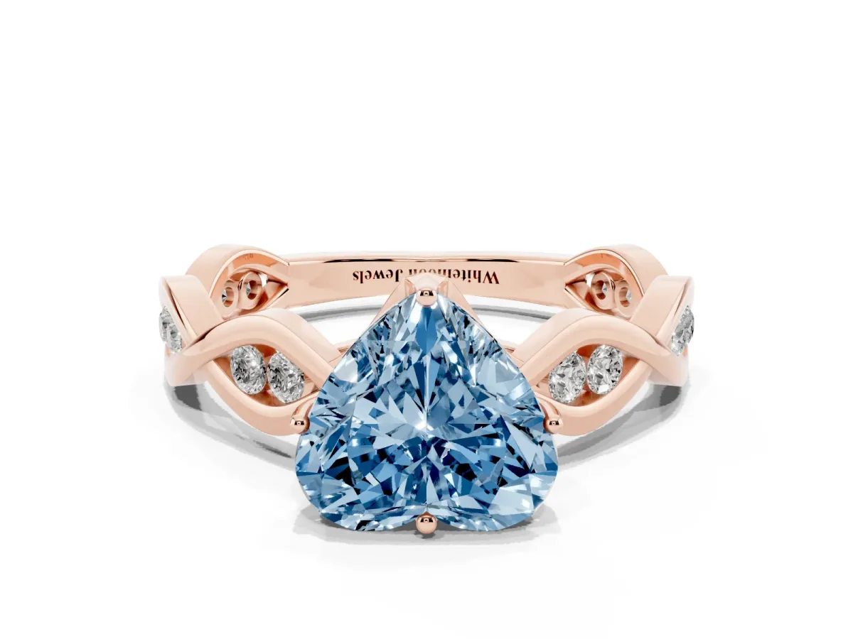 Fancy Blue Heart Cut Solitaire Twist Band with Leaf Prong Setting Rose gold
