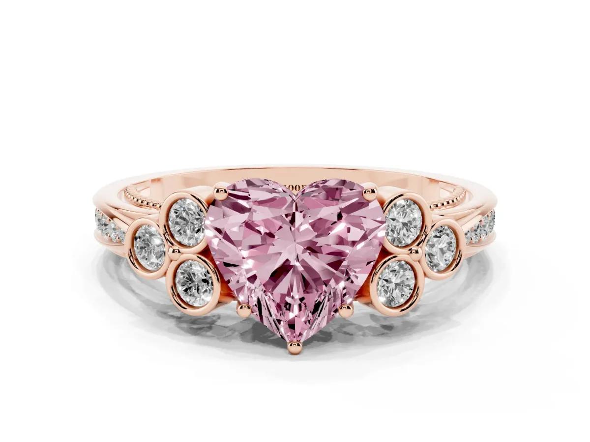 Fancy Pink Heart Cut Cut Diamond Engagement Ring with Bezel Set Round Side Stones and Prong Setting Rose gold