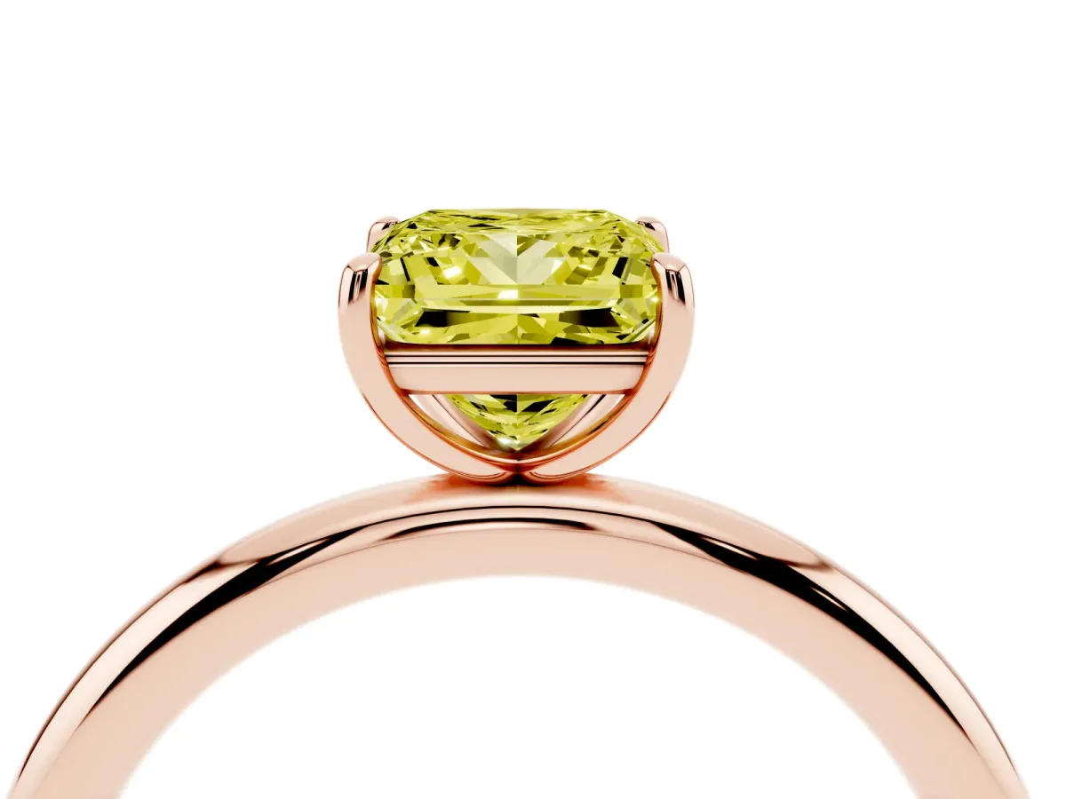 Fancy Yellow Princess Cut Solitaire Diamond Ring with Four-Prong Setting on a Plain Band Rose gold