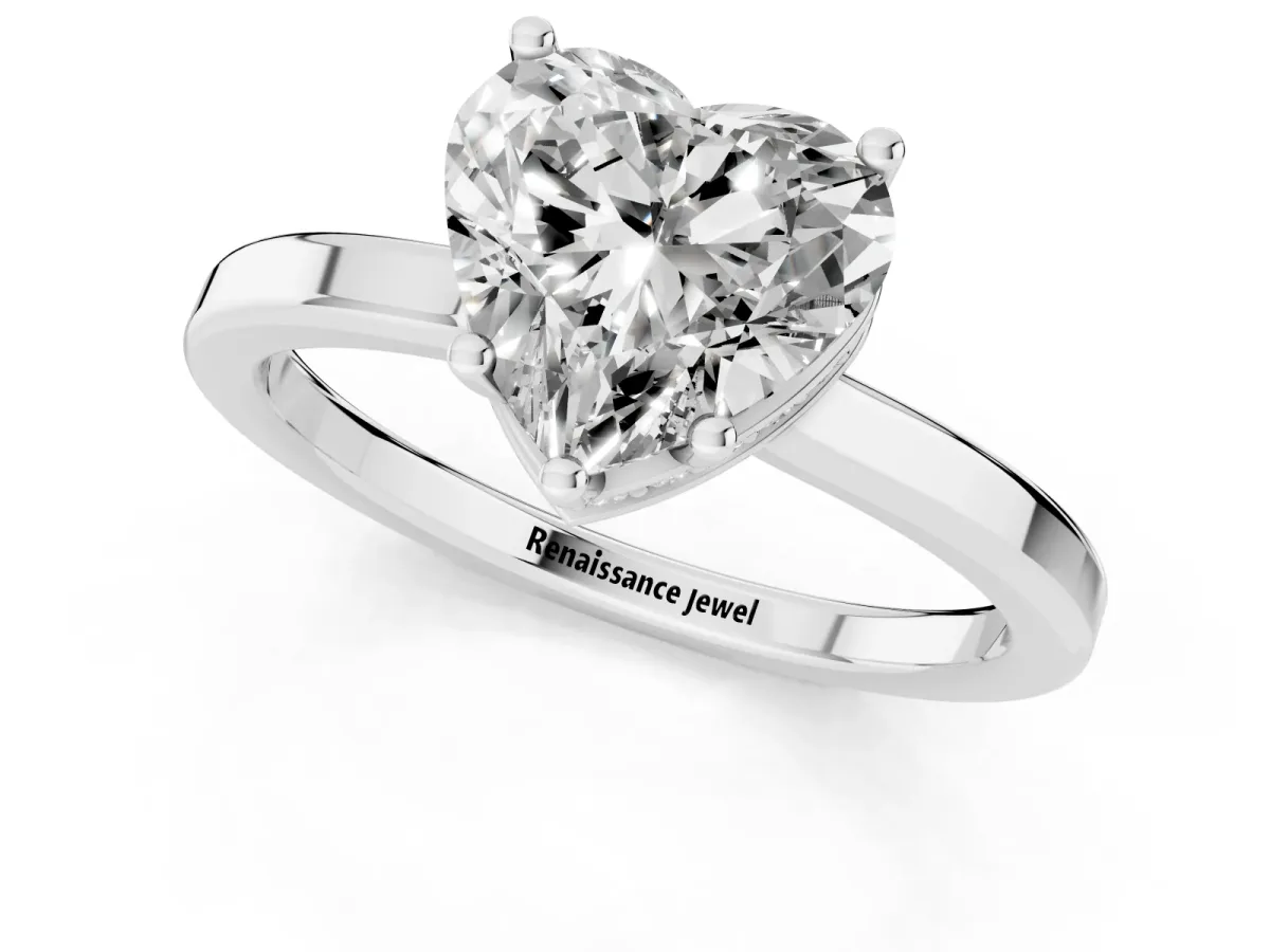 Heart Cut Cut Solitaire Engagement Ring with Four-Prong Setting on a Classic Band Silver