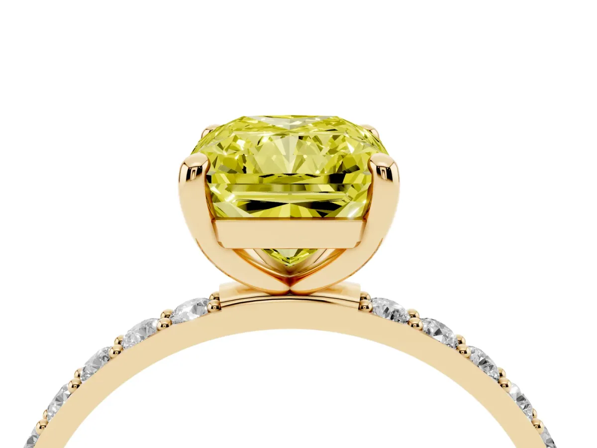 Fancy Yellow Radiant Cut Diamond Solitaire Ring with Round Pavé Band and Prong Setting Yellow gold
