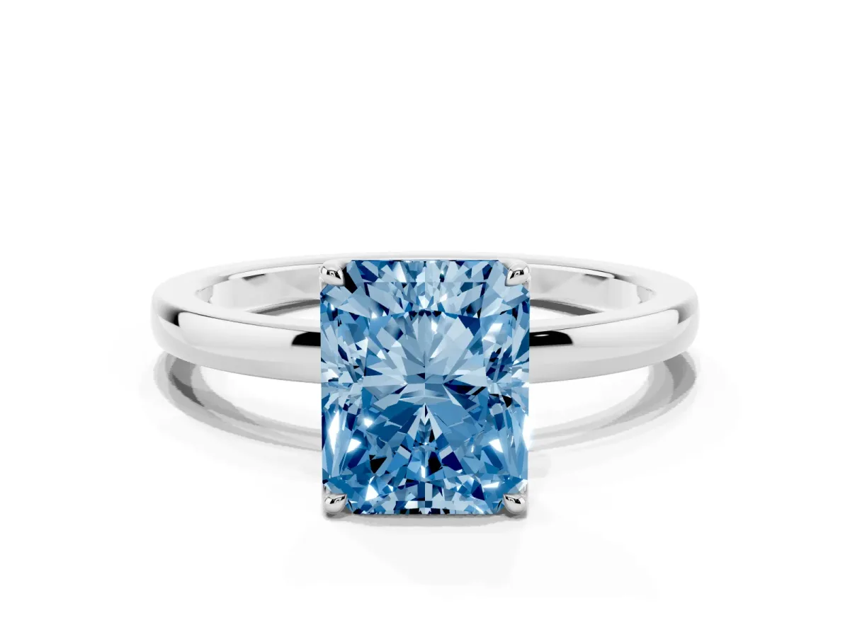 Fancy Blue Radiant Cut Diamond Solitaire Ring with Thin Band and Prong Setting White gold
