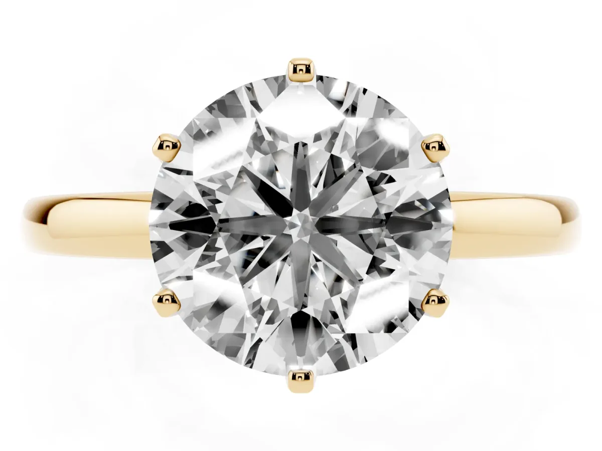 Round Cut Solitaire Diamond Ring with Six-Prong Setting on a Classic Band Yellow gold