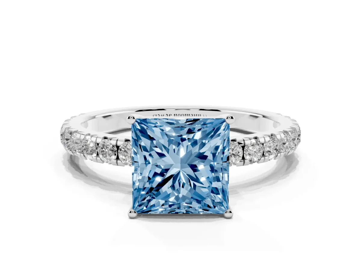Fancy Blue Princess Cut Diamond Pavé Solitaire Engagement Ring with Four-Prong Setting Silver