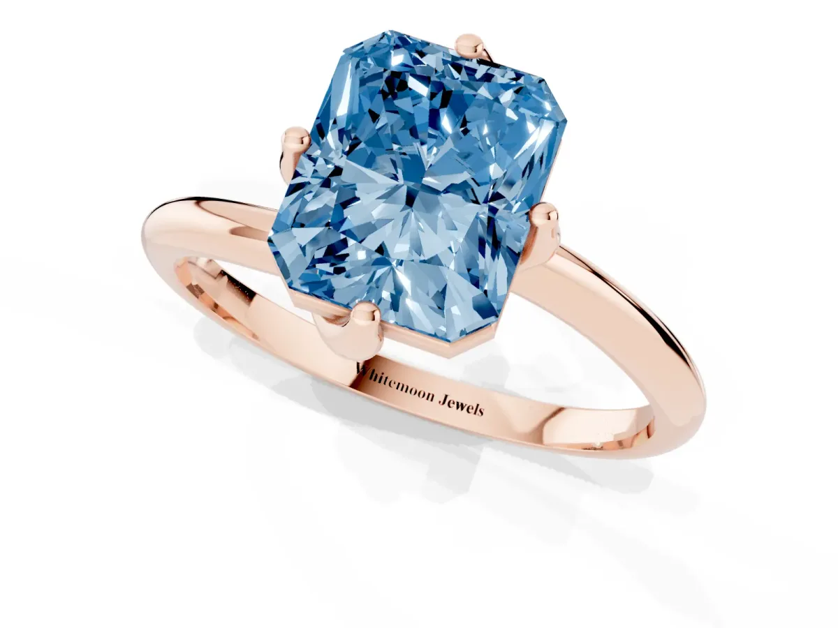Fancy Blue Radiant Cut Diamond Solitaire Engagement Ring with Four-Prong Setting and Classic Band Rose gold
