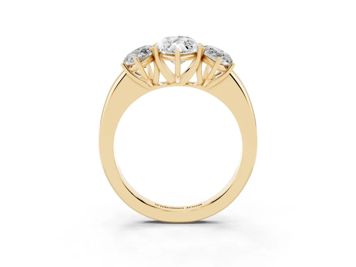 Marquise Cut Diamond Three-Stone Ring with Four-Prong Setting and Classic Band Yellow gold
