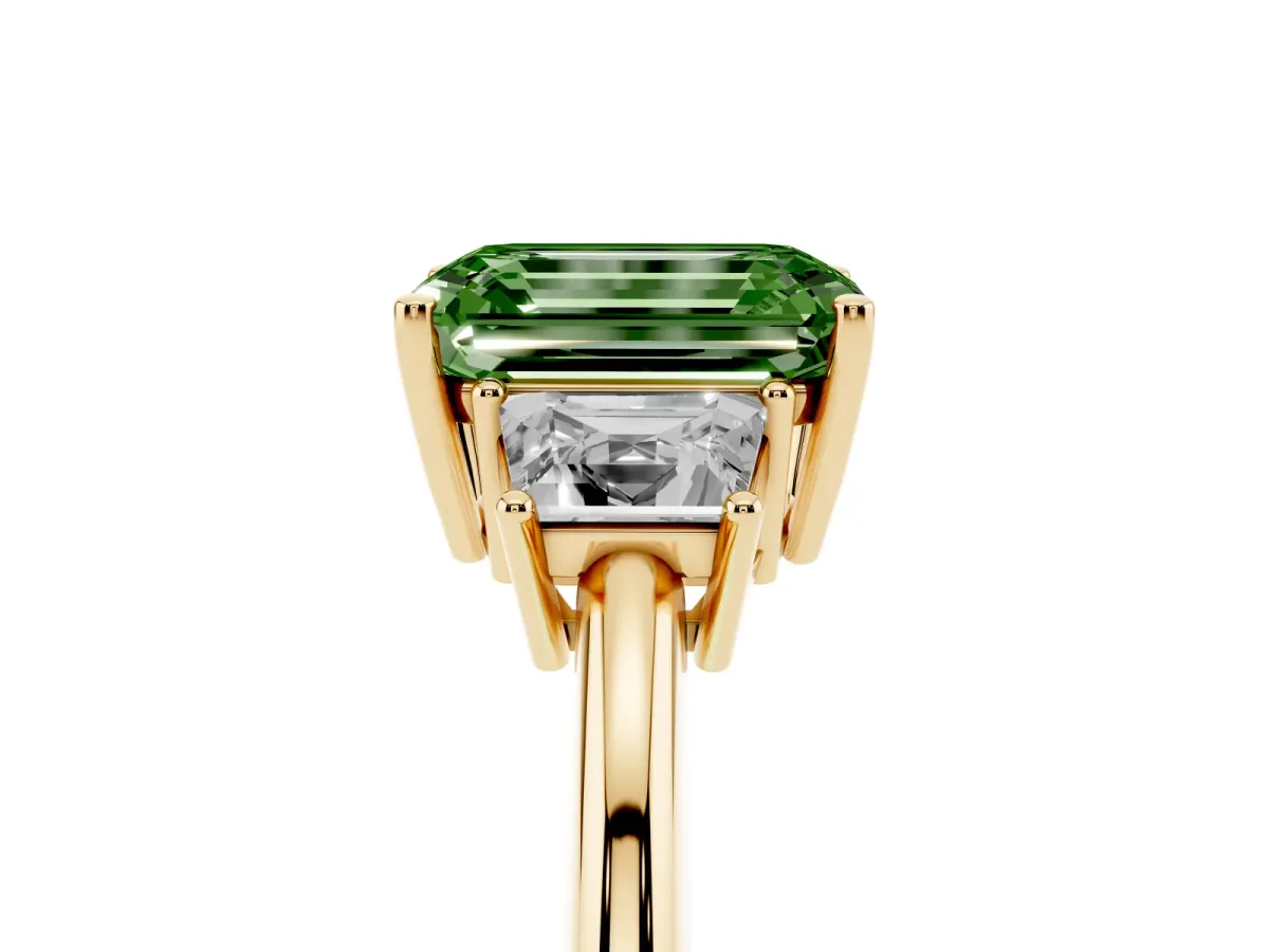 Fancy Green Emerald Cut Diamond Three-Stone Ring with Trapezoid Side Stones and Prong Setting Yellow gold