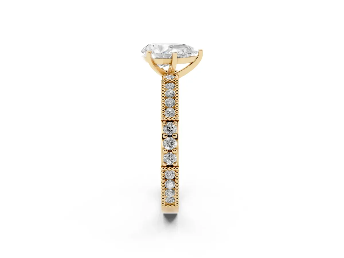Pear Cut Solitaire with Pavé Band and Four-Prong Setting Yellow gold