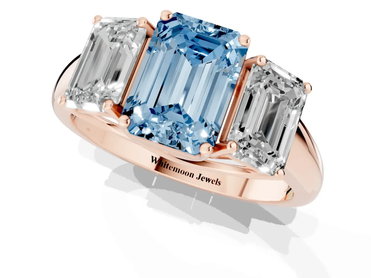 Fancy Blue Three-Stone Emerald Cut Diamond Engagement Ring with Prong Setting Rose gold