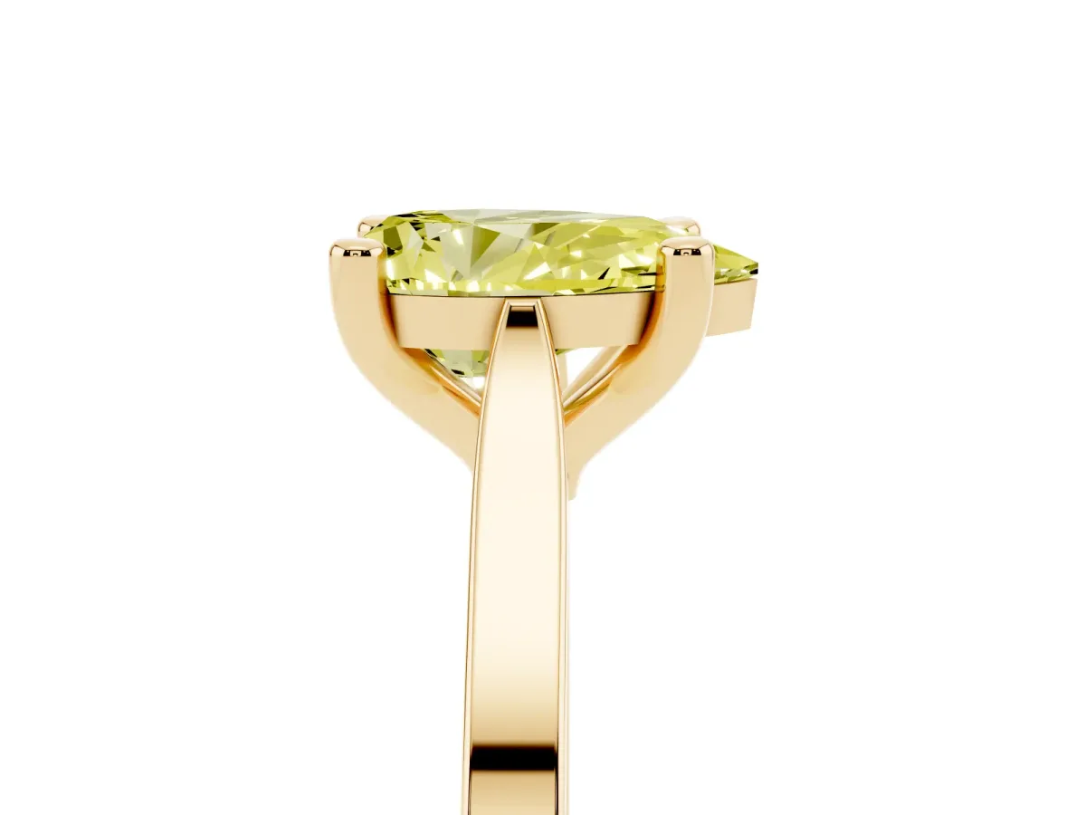 Fancy Yellow Pear Cut Solitaire Diamond Ring with Four-Prong Setting and Tapered Band Yellow gold