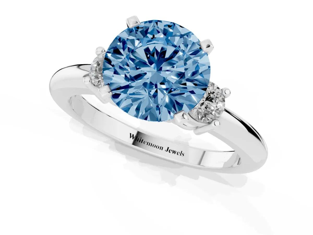 Fancy Blue Three-Stone Round Cut Cut Diamond Solitaire with Prong Setting and Classic Band Silver