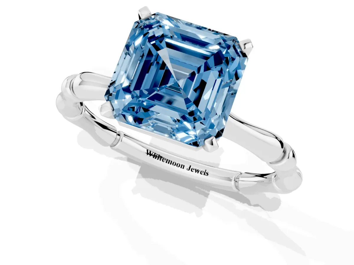 Fancy Blue Asscher Cut Solitaire Diamond Ring with Bamboo Band and Four-Prong Setting Platinum