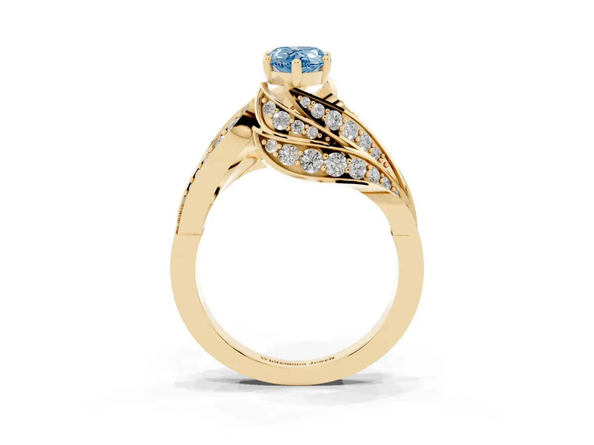 Fancy Blue Pear Cut Diamond Solitaire Ring with Prong Setting and Twisted Pavé Band Yellow gold