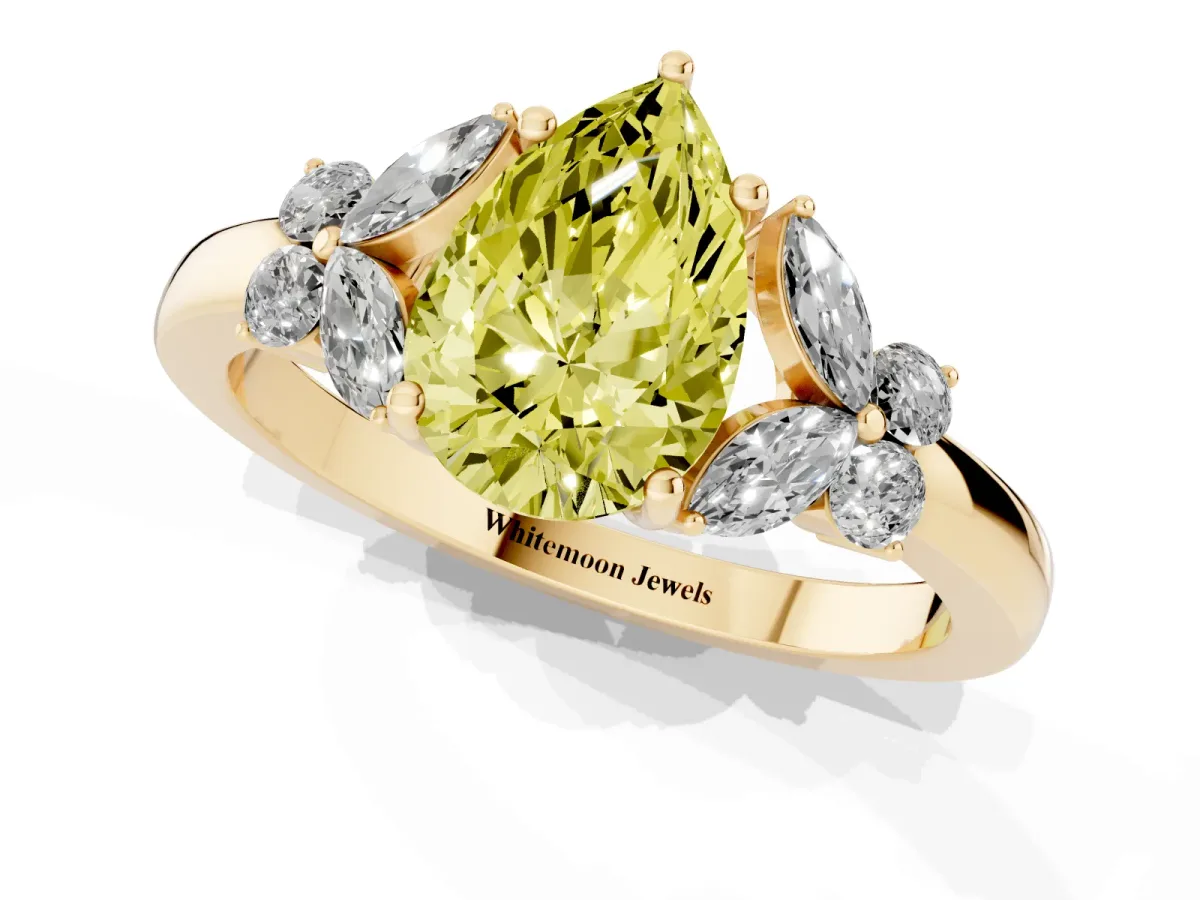 Fancy Yellow Pear Cut Cut Solitaire Floral Diamond Ring with Four-Prong Setting Yellow gold