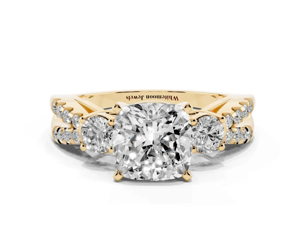 Cushion Cut Diamond Three-Stone Ring with Pavé Split Shank and Four-Prong Setting Yellow gold