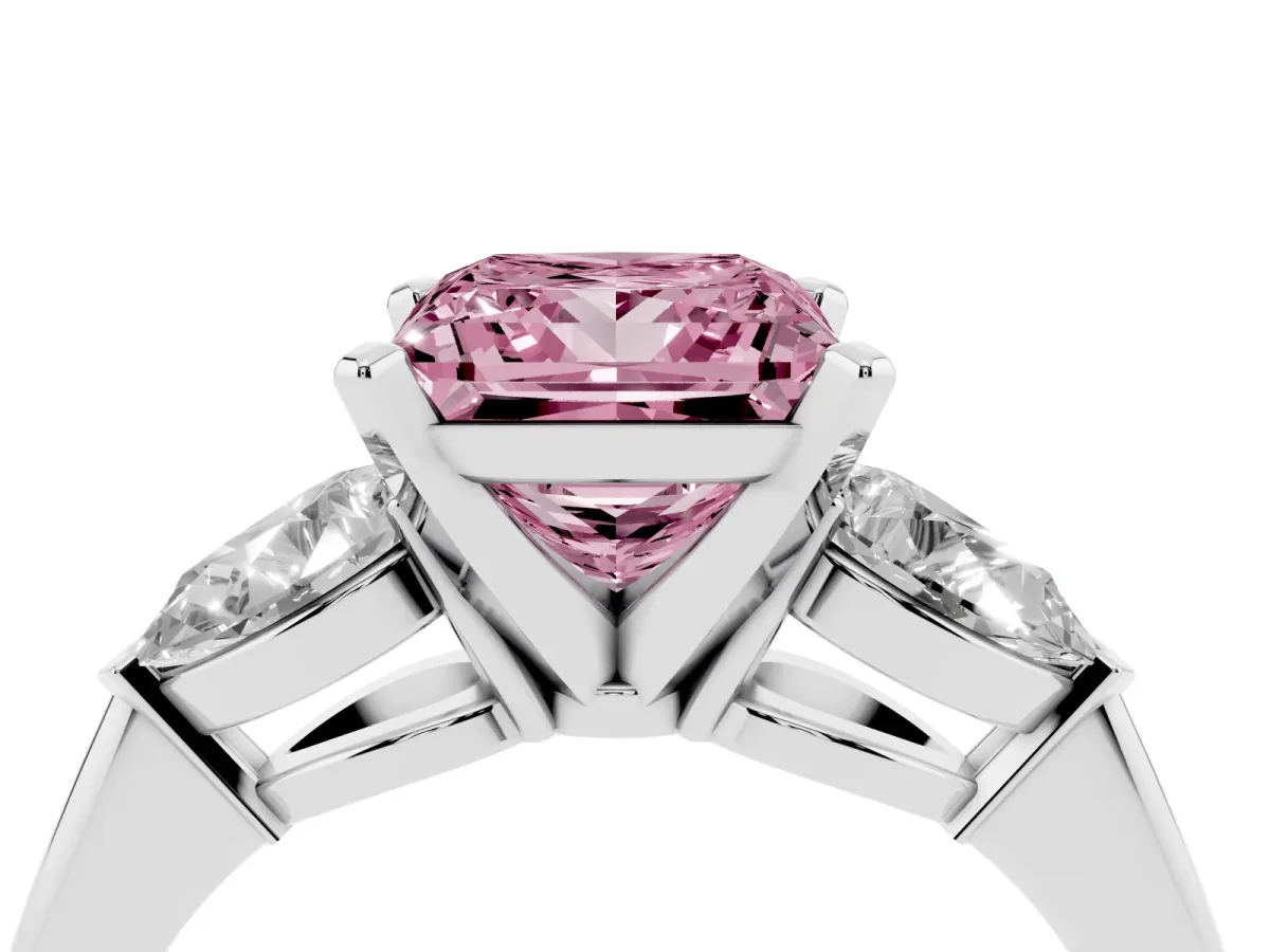 Fancy Pink Three-Stone Princess Cut Diamond Ring with Pear Side Stones and Four-Prong Setting Silver