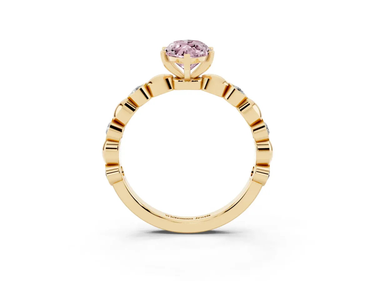 Fancy Pink Marquise Cut Solitaire Bezel-Set Diamond Ring with Beaded Band and Four-Prong Setting Yellow gold