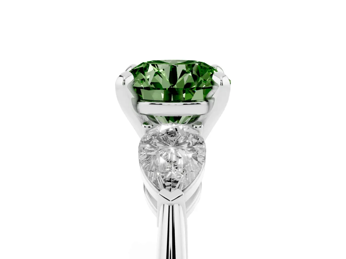 Fancy Green Three-Stone Round Cut Diamond Ring with Pear Side Stones and Four-Prong Setting Platinum
