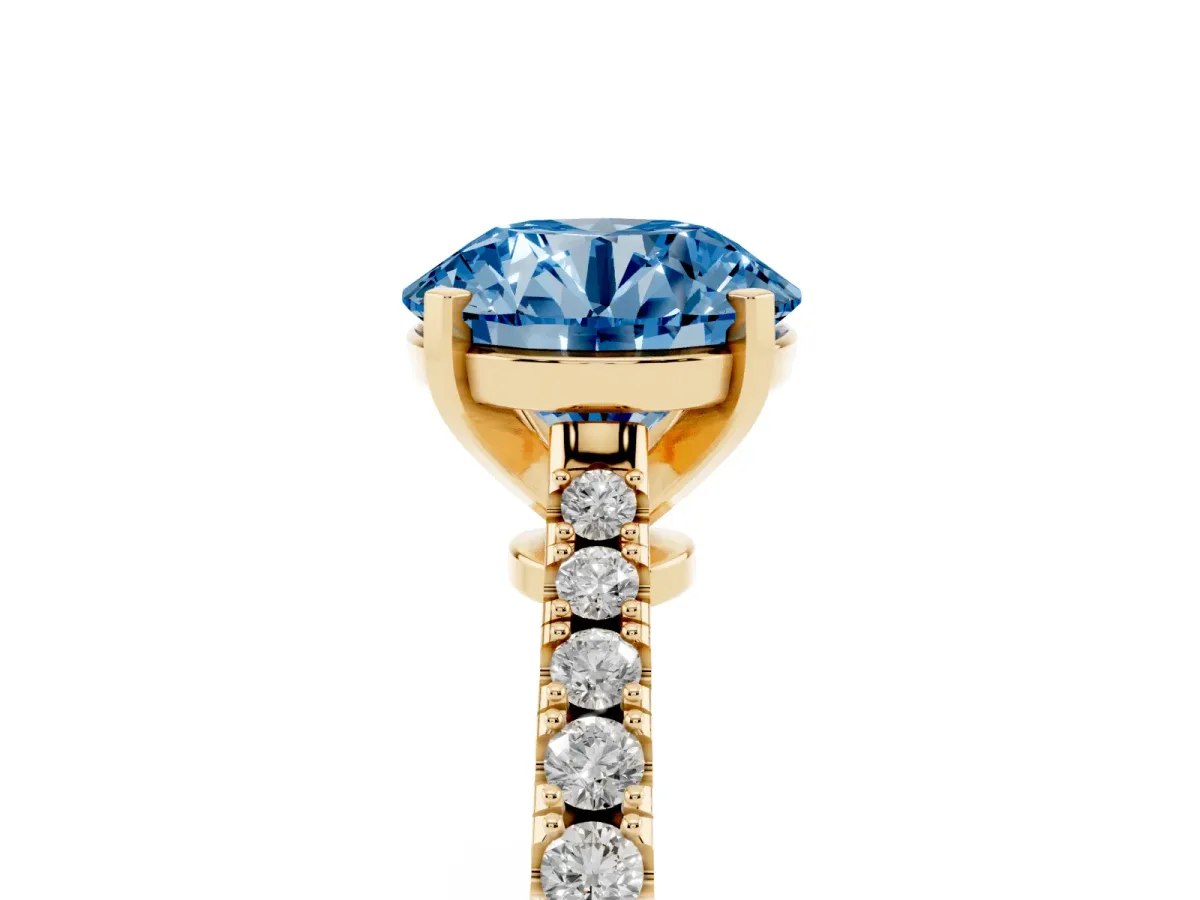 Fancy Blue Round Cut Cut Solitaire Diamond Engagement Ring with Pave Band and Four-Prong Setting Yellow gold