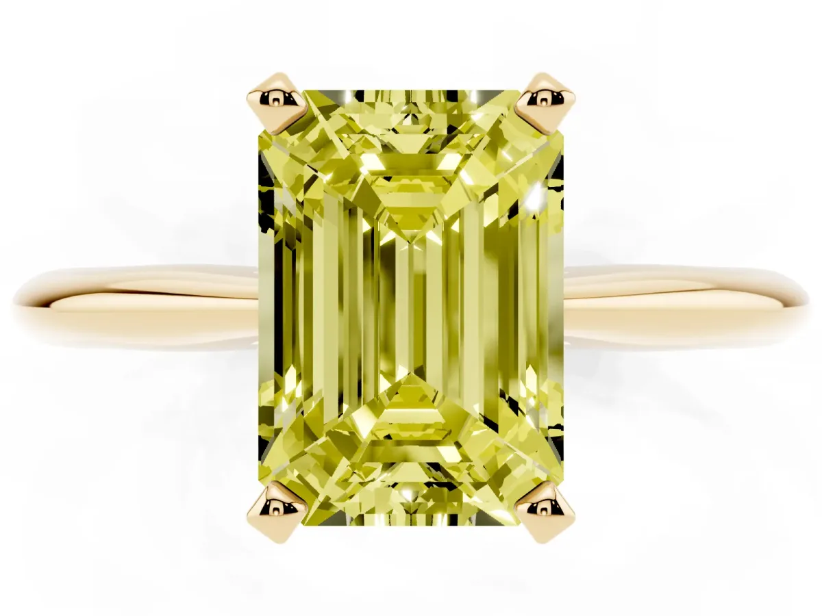 Fancy Yellow Emerald Cut Cut Solitaire Ring with Four-Prong Setting on a Classic Band Yellow gold