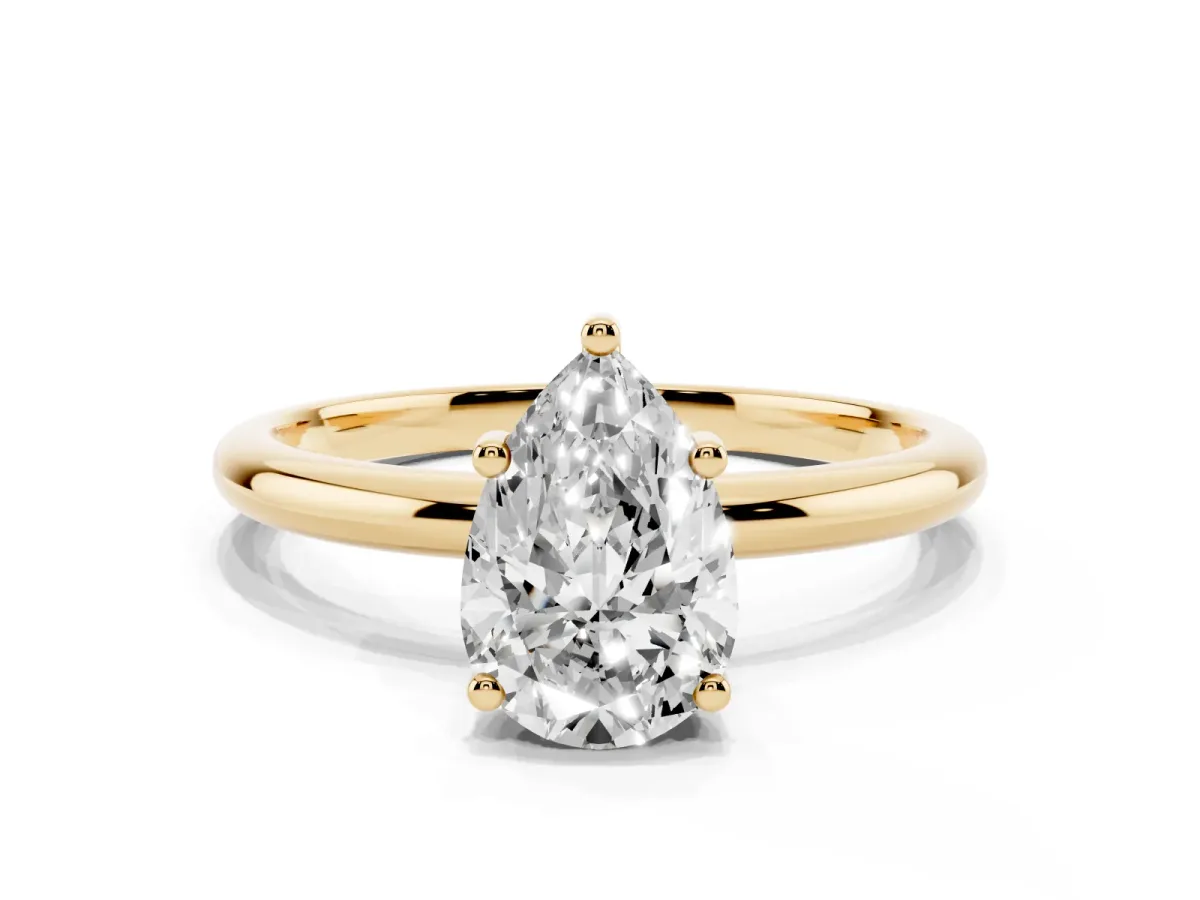 Pear Cut Cut Solitaire Engagement Ring with Four-Prong Setting and Classic Band Yellow gold