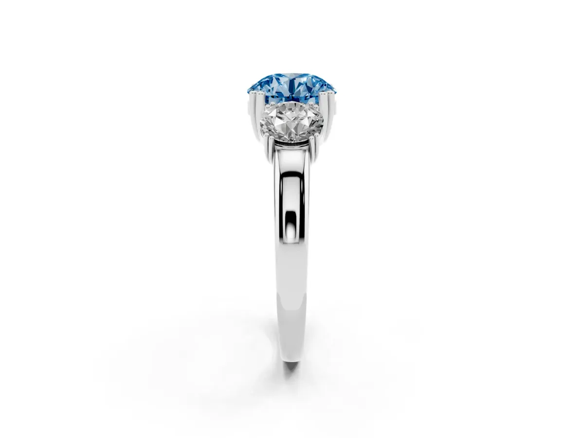 Fancy Blue Three-Stone Round Cut Cut Diamond Ring with Channel Set Band and Four-Prong Setting Silver