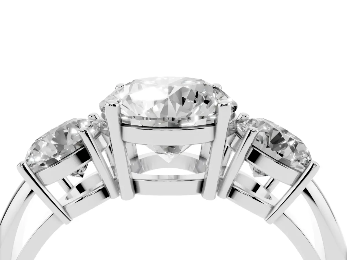 Three-Stone Round Cut Cut Diamond Engagement Ring with Prong Setting on a White Gold Band Platinum
