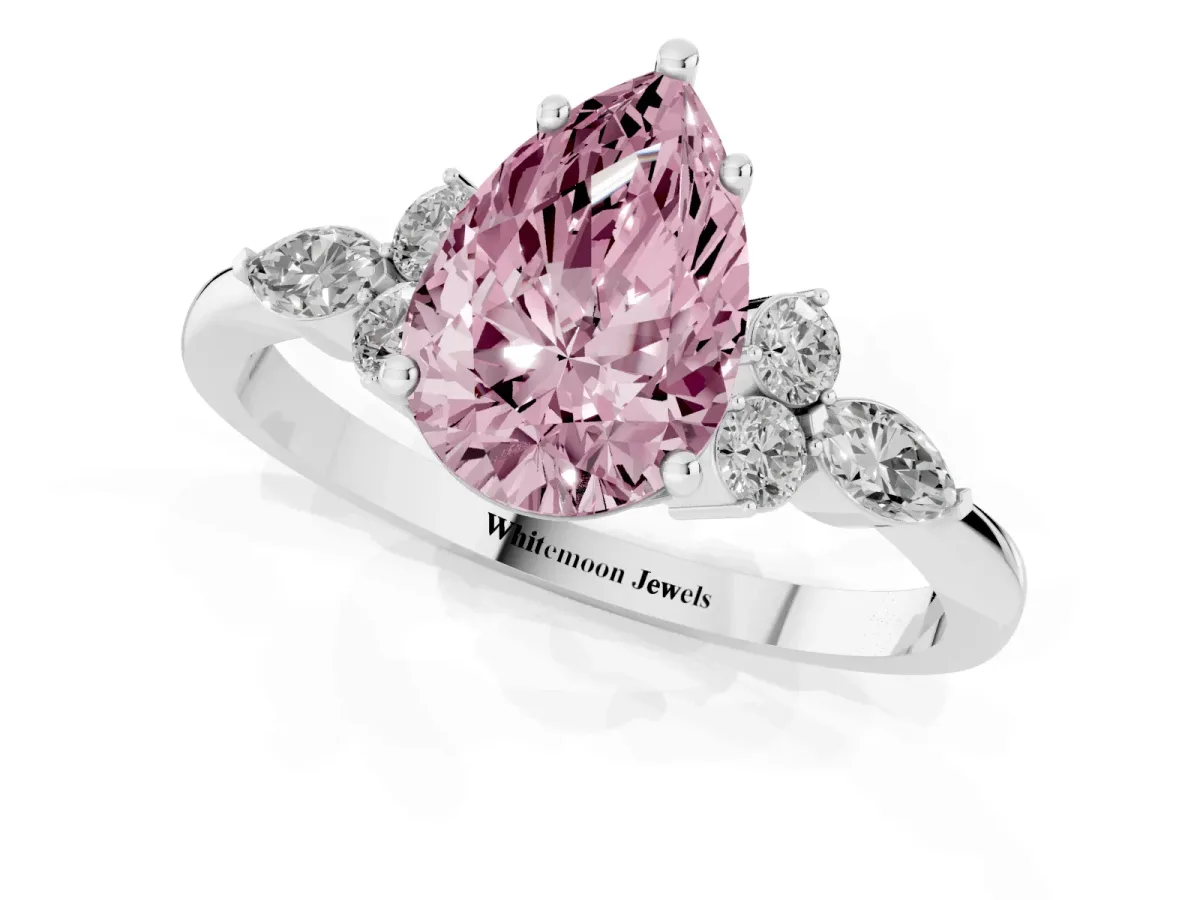 Fancy Pink Pear Cut Brilliant Diamond Solitaire Ring with Pear Side Stones and Four-Prong Setting Silver