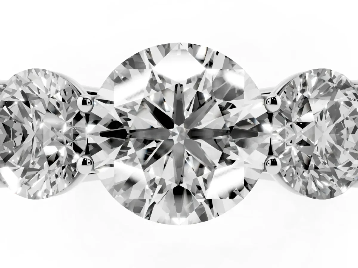 Round Cut Three-Stone Diamond Ring with Prong Setting on a Classic Band Platinum