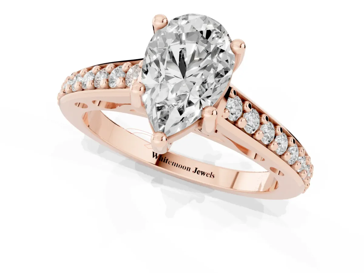 Pear Cut Solitaire Prong Set Diamond Engagement Ring with Pave Band Rose gold