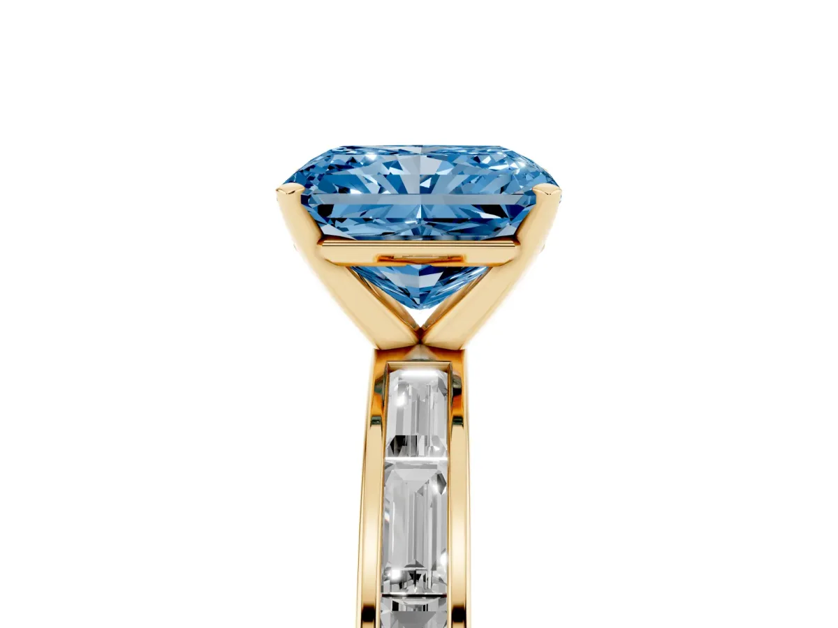 Fancy Blue Radiant Cut Solitaire Diamond Ring with Channel-Set Baguette Band and Four-Prong Setting Yellow gold