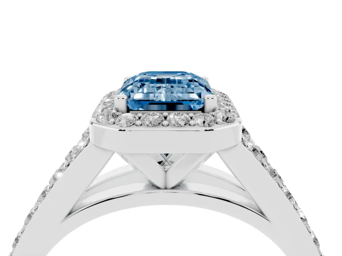 Fancy Blue Emerald Cut Diamond Split Shank Halo Ring with Four-Prong Setting Silver