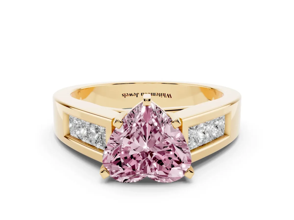 Fancy Pink Heart Cut Cut Channel Set Solitaire Ring with Four-Prong Setting Yellow gold