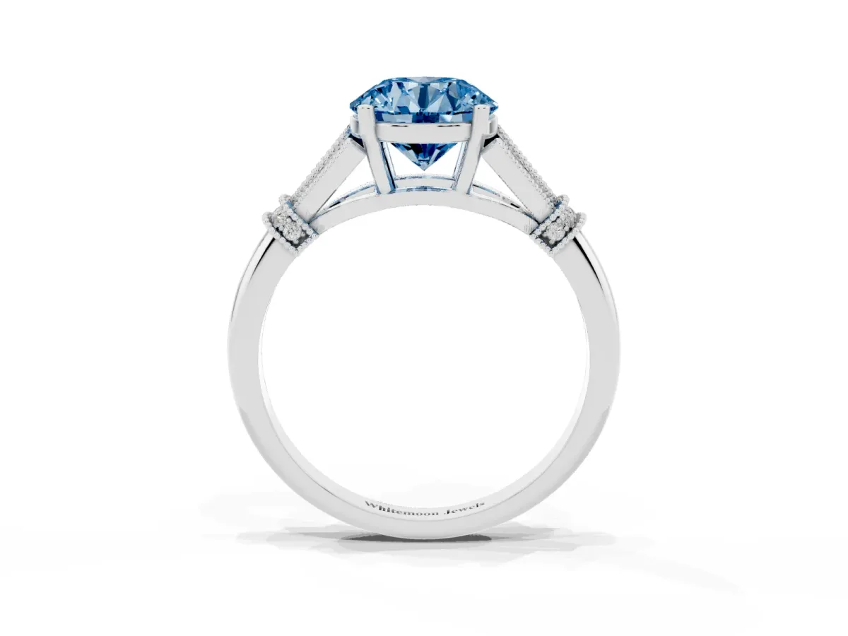 Fancy Blue Round Cut Diamond Solitaire Ring with Floral Filigree and Pave Accents White gold