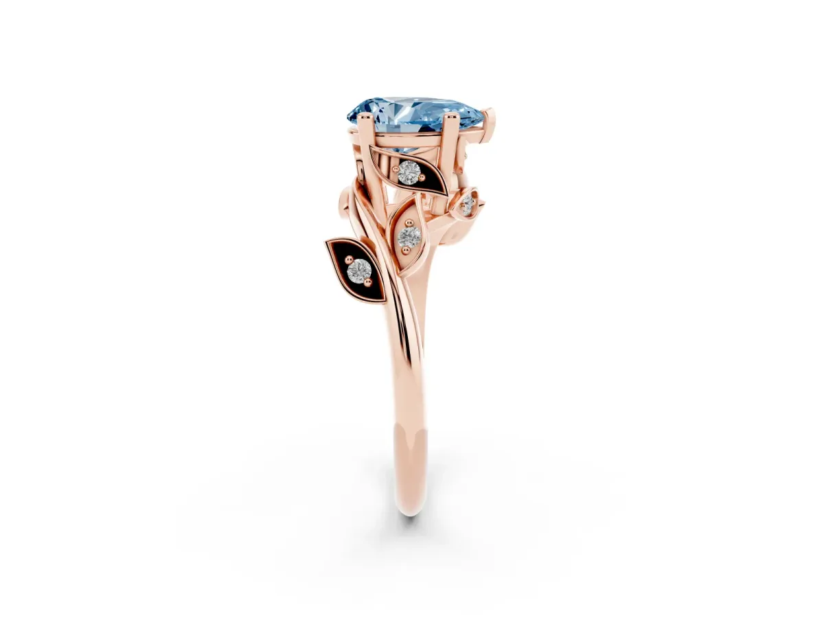 Fancy Blue Pear Cut Solitaire Twist Engagement Ring with Leaf Accents and Prong Setting Rose gold