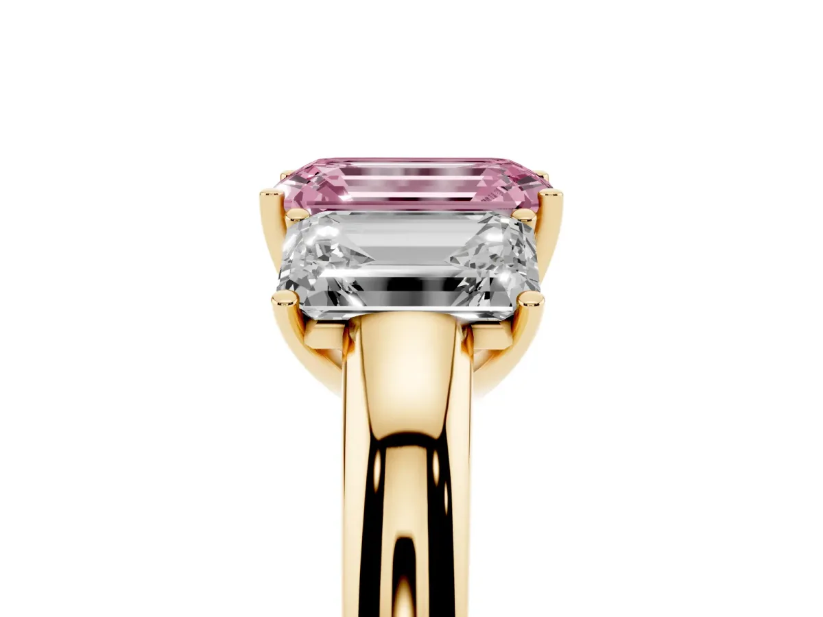 Fancy Pink Emerald Cut Diamond Three-Stone Ring with Four-Prong Setting and Classic Band Yellow gold