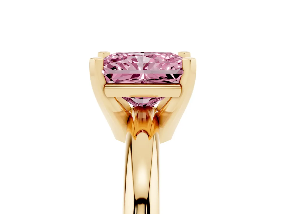 Fancy Pink Radiant Cut Diamond Solitaire Engagement Ring with Round Band and Four-Prong Setting Yellow gold