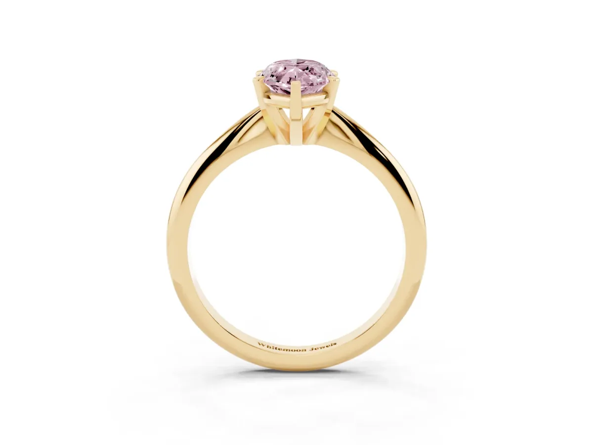 Fancy Pink Marquise Cut Cut Solitaire Ring with Four-Prong Setting on a Classic Band Yellow gold