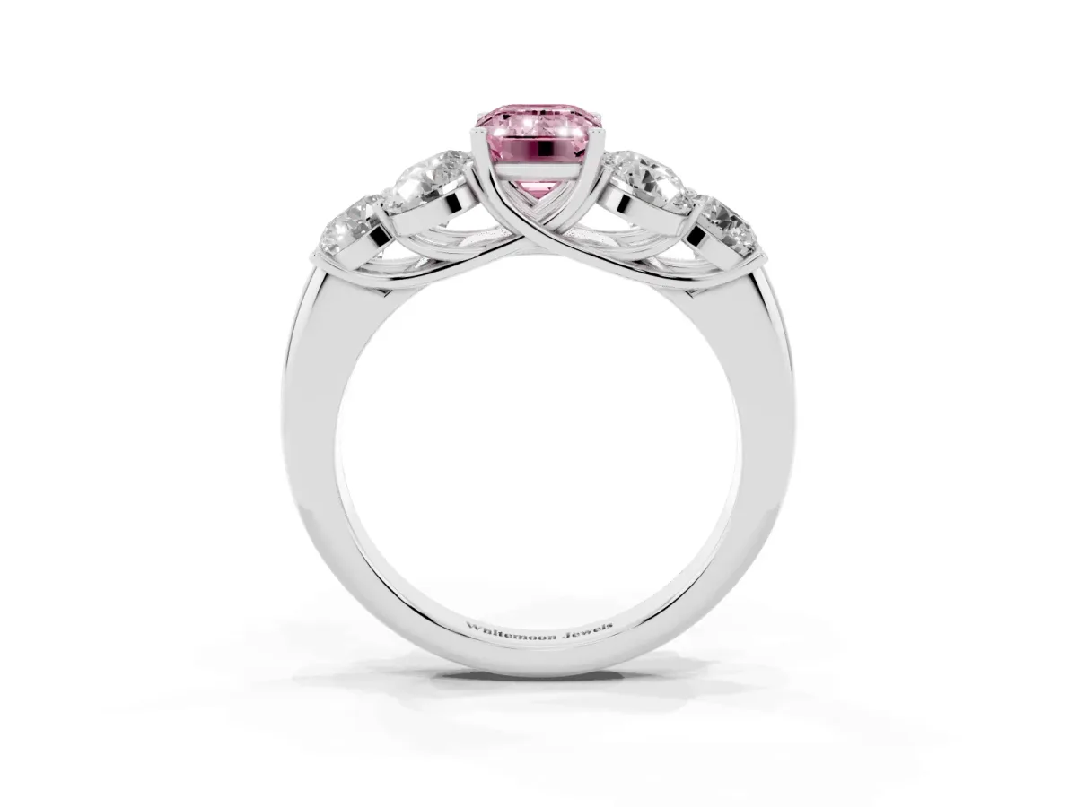 Fancy Pink Emerald Cut Cut Diamond Cluster Ring with Round Accent Stones and Prong Setting on a Classic Band Silver