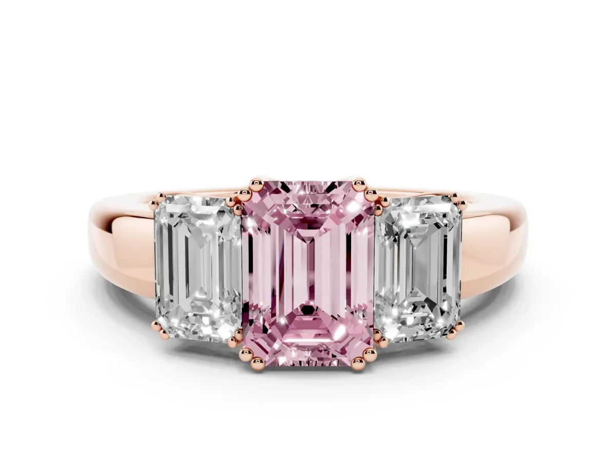 Fancy Pink Three-Stone Emerald Cut Cut Diamond Ring with Channel Set Band and Four-Prong Setting Rose gold