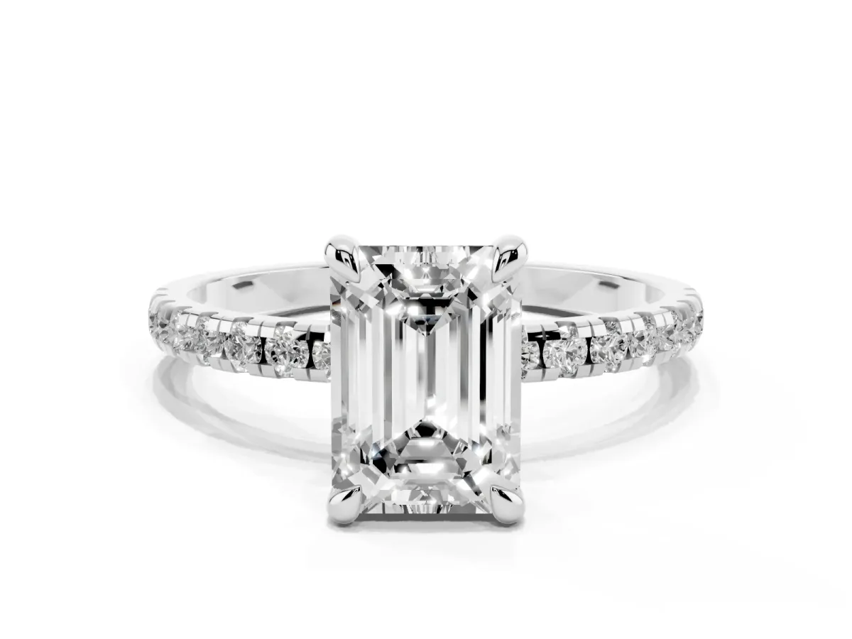 Emerald Cut Diamond Brilliant Solitaire Ring with Pavé Band and Four-Prong Setting White gold