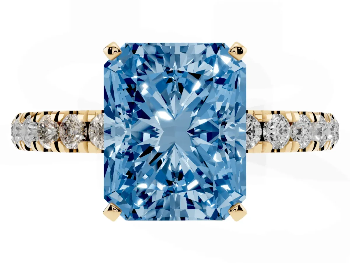 Fancy Blue Radiant Cut Diamond Solitaire Ring with Pavé Accents and Four-Prong Setting Yellow gold