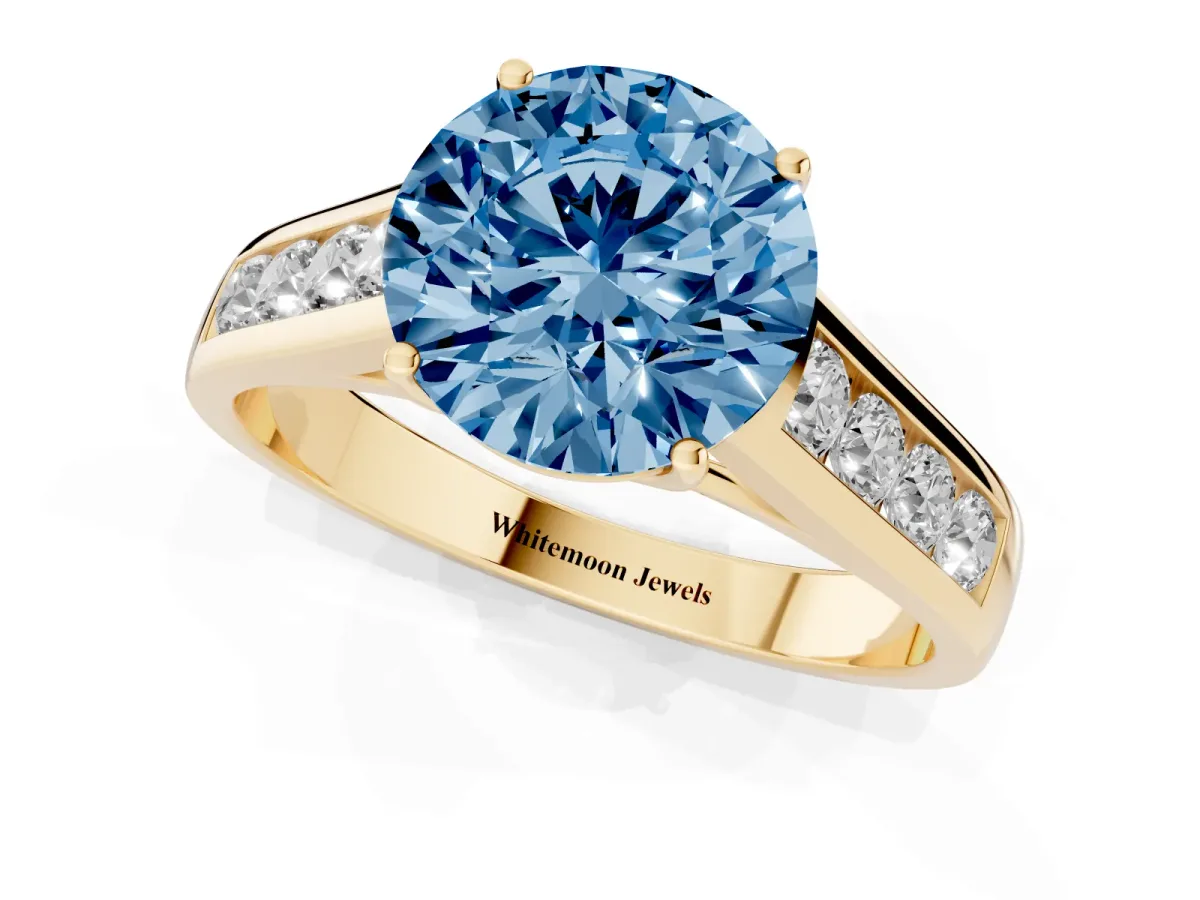 Fancy Blue Round Cut Brilliant Channel-Set Solitaire Ring with Four-Prong Setting Yellow gold