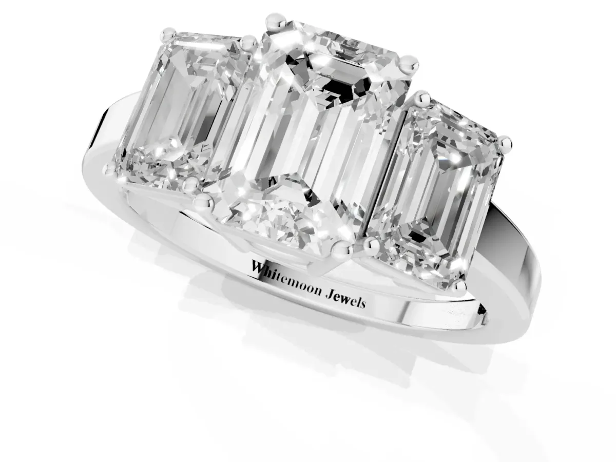 Three-Stone Emerald Cut Cut Diamond Engagement Ring with Flat Band and Four-Prong Setting Platinum