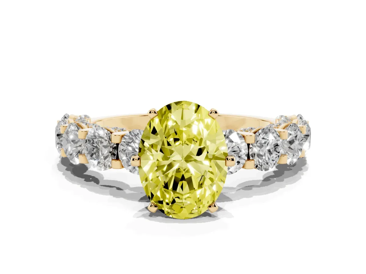 Fancy Yellow Oval Cut Diamond Side Stone Engagement Ring with Four-Prong Setting Yellow gold