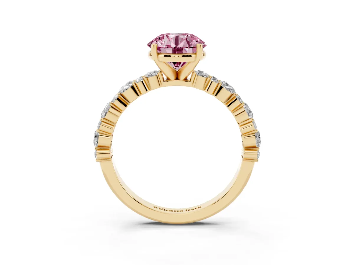Fancy Pink Round Cut Diamond Side Stone Solitaire Ring with Round and Four-Prong Setting Yellow gold