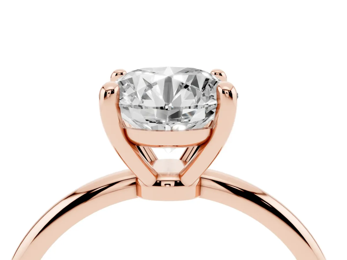 Round Cut Solitaire Diamond Ring with 4-Prong Setting on a Classic Band Rose gold
