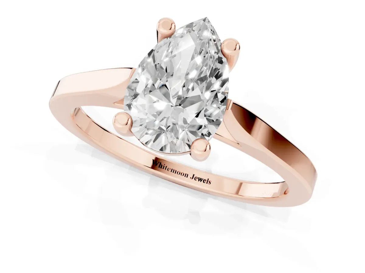 Pear Cut Solitaire Diamond Ring with Four-Prong Setting and Tapered Band Rose gold
